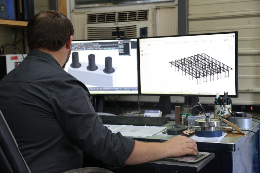 Designer creates CAD in computer software.
